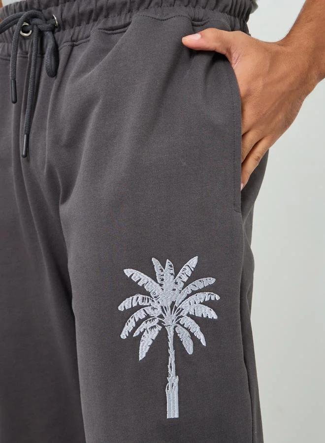 Styli Men Slim Fit Palm Embroidery Joggers